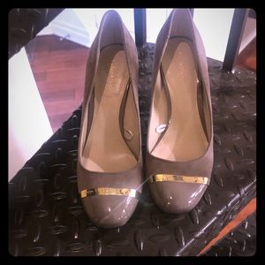 Calvin Klein suede with patent leather toe/heel.